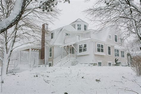 House After Snow Blizzard Del Colaborador De Stocksy Raymond Forbes