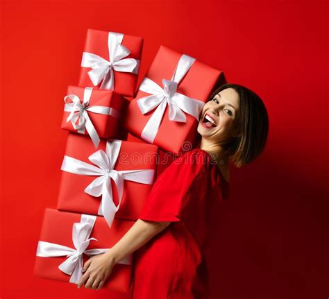 Joyful Woman Holding A Lot Of Boxes With Ts Stock Image Image Of Person Female 139624797