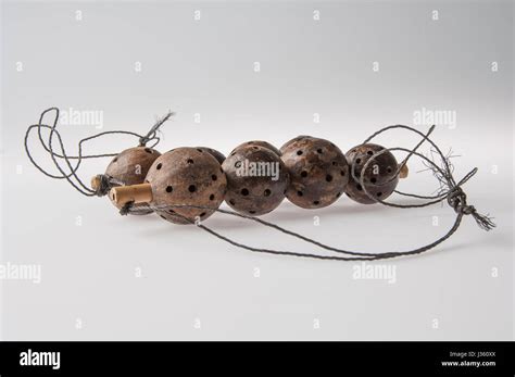 African Handmade Instrument Rattle Isolated On White Background Stock
