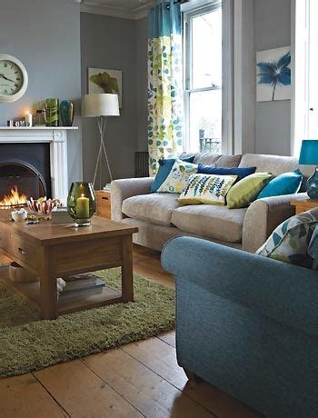 The mostly gray and blue living room color scheme reminds of stormy ocean waves. Demystifying Colour For Your Interiors! | Living room ...
