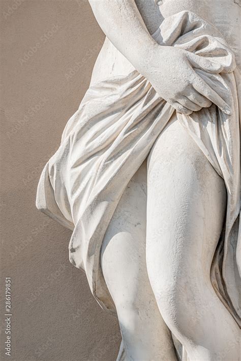 Statue Of Ancient Sensual Half Naked Renaissance Era Woman With Long Baked Legs In Potsdam At