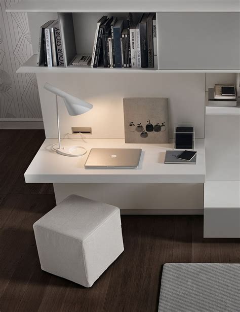 Italian wall unit with desk 038s by tomasella. Chic workspace with a built-in desk and cube ottoman for ...