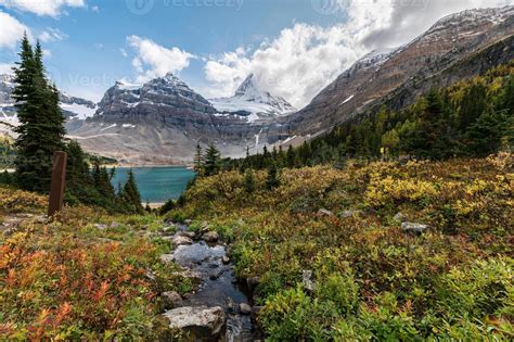 Scenery Of Mount Assiniboine With Lake Magog In Autumn Forest At