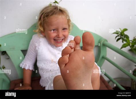 Small Girl Showing Her Foot Stock Photo Alamy