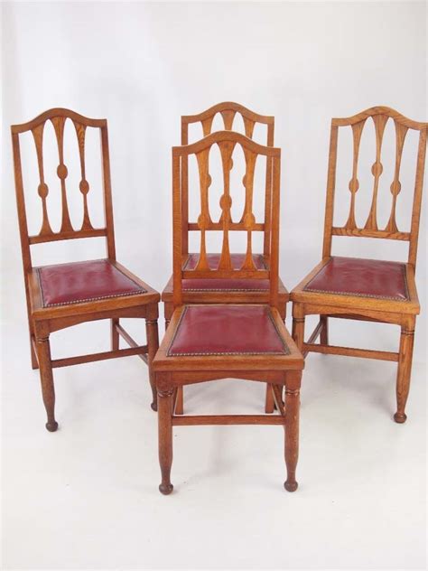 The faceted ends of the legs and seatback invite your hand to touch them. Set 4 Antique Arts & Crafts Oak Dining Chairs