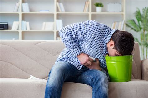 The Man Suffering From Sick Stomach And Vomiting Stock Photo Image Of