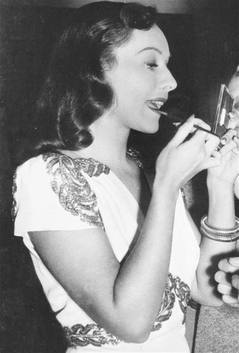 Paulette Goddard Fixing Her Make Up Between Scenes Of Nothing But The