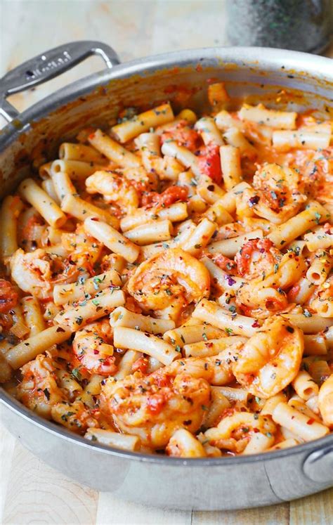 Since i like some spice i add some red pepper flakes but you could leave them out. Spicy Shrimp Pasta in Garlic Tomato Cream Sauce - Julia's ...