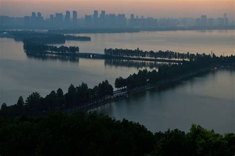 East Lake Greenway Park With The Wuhan Skyline Behind Hubei China