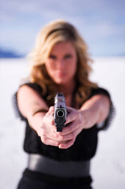 Pointing Gun At Camera Stock Photos Pictures And Royalty Free Images