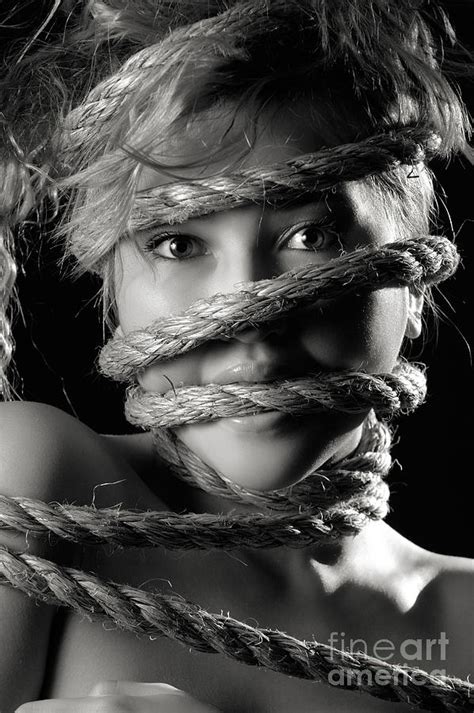 Woman Face And Mouth Tied In Ropes Photograph By Maxim Images