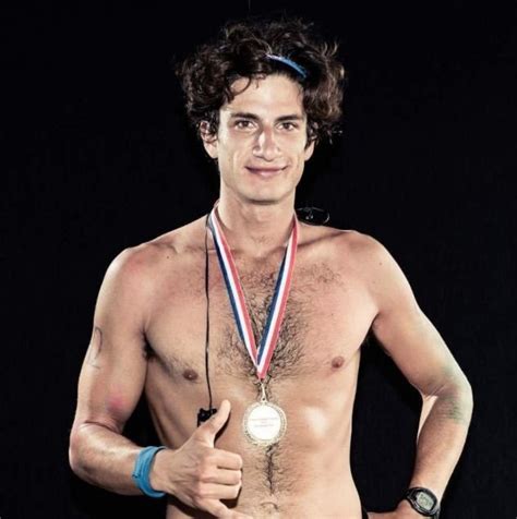 Jack Schlossberg With His Medal After Paddleboarding Around Manhattan
