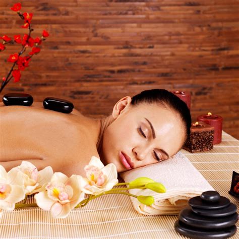 the process involves placing hot stones on certain points on your body and massaging while the