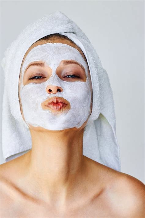 Beautiful Woman With Facial Mask On Her Face Skin Care And Treatment Spa Natural Beauty And