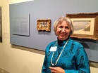 Author Susan Helen Adler in front of the returned Renoir painting, Au ...