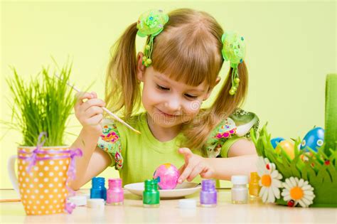 Child Girl Painting Easter Eggs Stock Image Image Of Happy Childhood