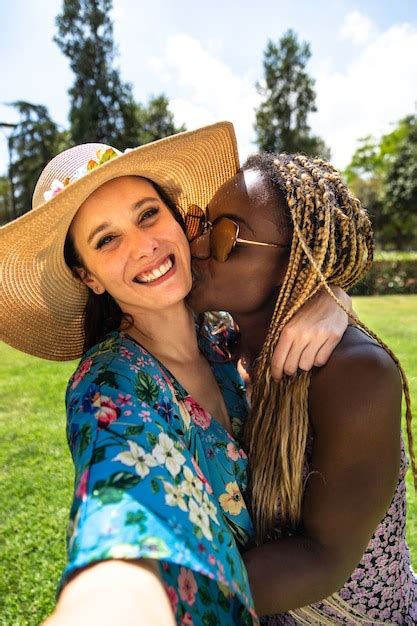 Premium Photo African American Lesbian Woman Kiss Girlfriend On Cheek Gay Couple Take Selfie