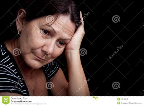 Older Woman With A Very Sad Expression Royalty Free Stock