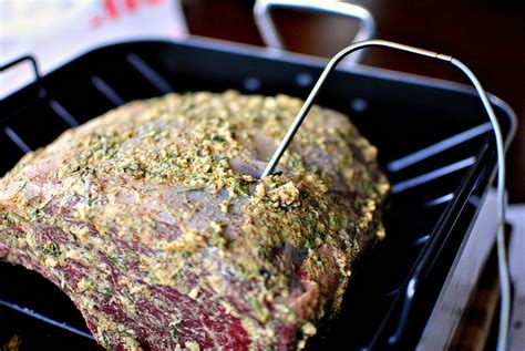 A prime rib recipe with a mustard and peppercorn coating to serve for a holiday or christmas dinner. Dijon-Rosemary Crusted Prime Rib Roast with Pinot Noir Au ...