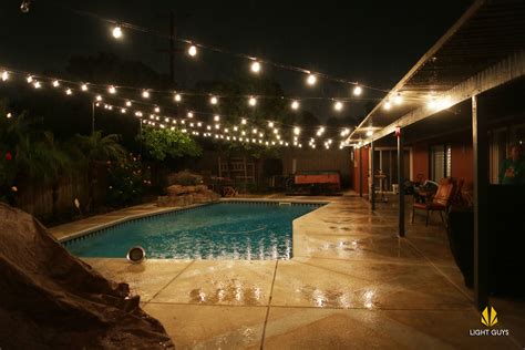 String Lights Over A Pool Goupilbrowy
