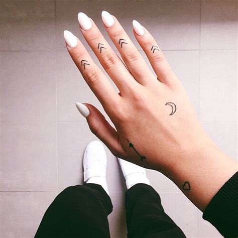 Snake tattoo on the arm and the hand - Tattoogrid.net