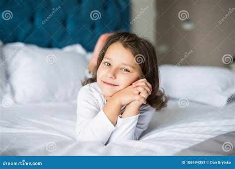 Portrait Of Beautiful Girl Dreaming In Bed Beauty Little Girl In Bed