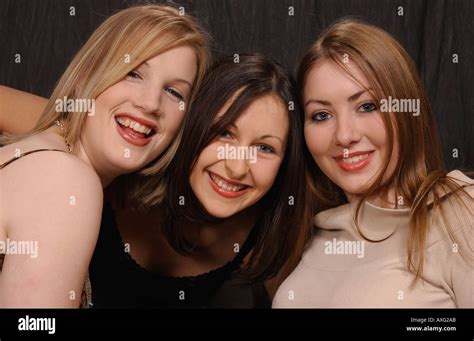 3 Teenage Girls Smiling Into Camera Stock Photo Alamy