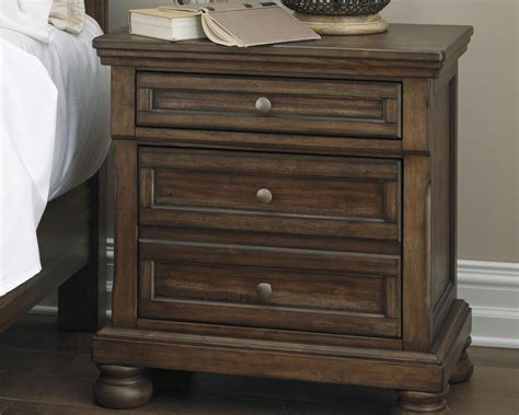 Signature Design By Ashley Flynnter Medium Brown Nightstand