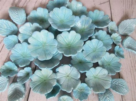 Overseas, artichoke is one edible flower that's a popular ingredient. Edible pastel blue flowers. Blue Sugarpaste flowers. Blue ...
