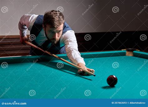 Man Holding Arm On Billiard Table Playing Snooker Game Or Preparing Aiming To Shoot Pool Balls
