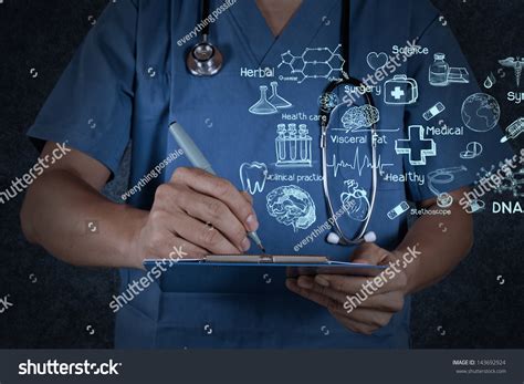 Medical Doctor With Stethoscope Writing On Texture Background Stock