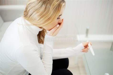Pregnancy Test Worried Sad Woman Looking At A Pregnancy Test After Result Stock Image Image