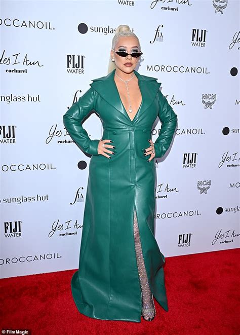 Christina Aguilera Dons A Plunging Emerald Dress At The Daily Front Row