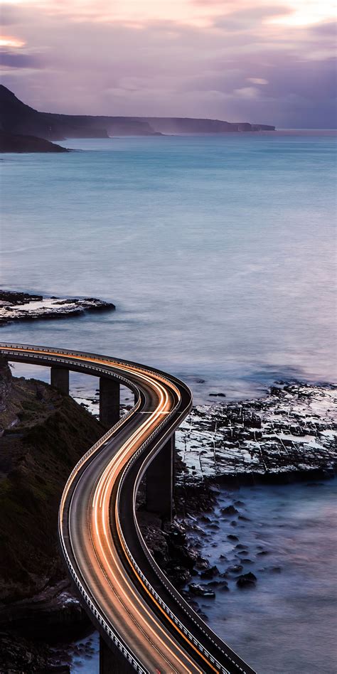 Download Wallpaper 1080x2160 Coastal Bridge Highway Light Trails