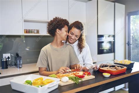 Happy Lesbian Couple Cooking Stock Image F Science Photo Library