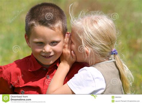 Whispering and smiling stock photo. Image of expression - 2802324
