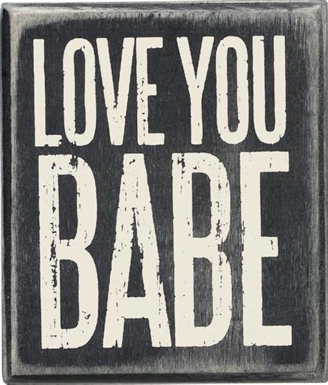 Simple And Romantic Box Sign Reads Love You Babe In Big Uppercase White Lettering Black