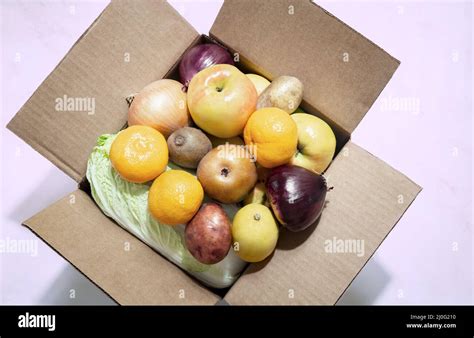 Cardboard Box With A Variety Of Vegetables And Fruits Stock Photo Alamy