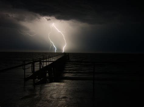 Storm Lightning Dark Clouds Water Ocean Pier Dock Black Hd Wallpaper