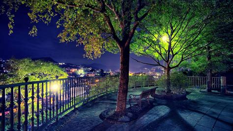 Beautiful Cityscape View From Park With Bench And Fence Hd Nature