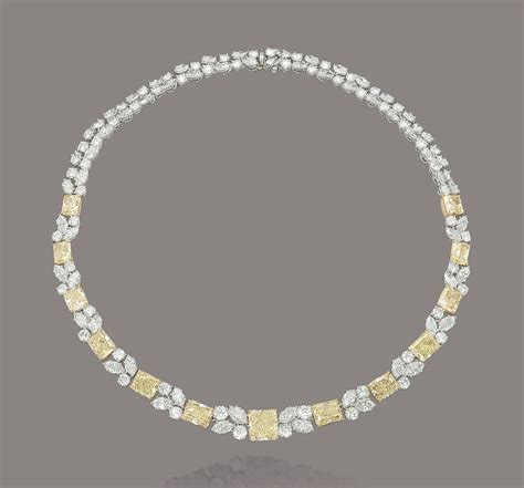 A Diamond And Coloured Diamond Necklace By Harry Winston