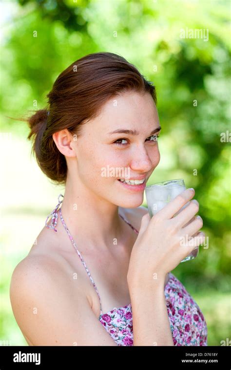 Woman Drinking Glass Of Water Stock Photo Alamy