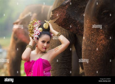 Portrait Of Beautiful Rural Thai Woman Wear Thai Dress With Elephant In Chiang Mai Thailand