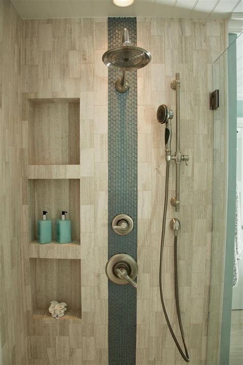 An Accent Stripe Of Glass Tiles Adds Interest To This Neutral Shower