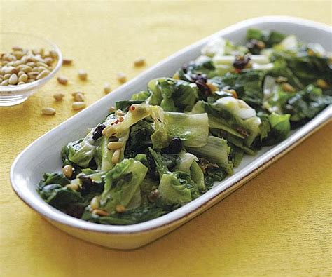 Sautéed Escarole With Raisins Pine Nuts And Capers Recipe Finecooking