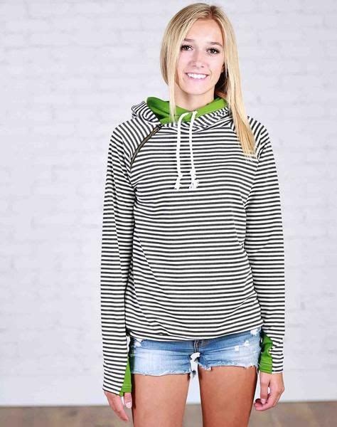 this cute green and black striped sweatshirt features a double hood thumb hole and shoulder
