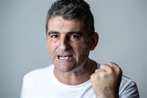 Portrait Of A Mature 40s To 50s White Angry And Upset Man Looking