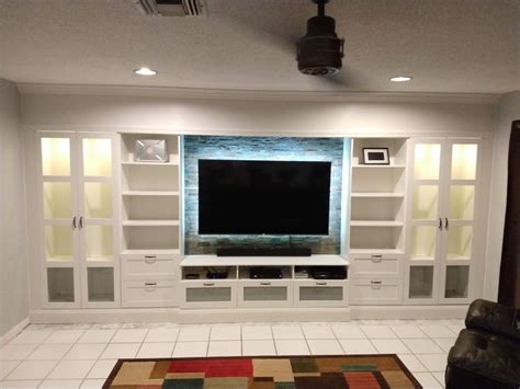 Some of our tv stands have open shelves, while others hide the storage behind cabinet doors. How to DIY an affordable IKEA entertainment wall | Ikea tv ...