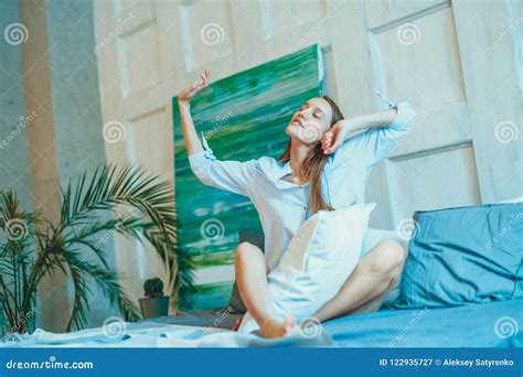 Beatiful Brunette Woman Stretching In Bed After Wake Up Stock Image