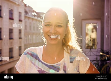 Blond Woman Standing Balcony Hi Res Stock Photography And Images Alamy